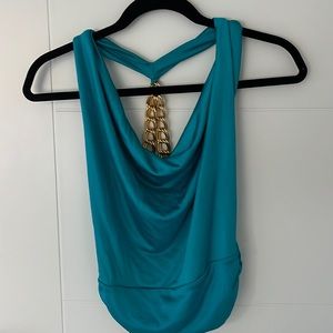 Small open back with gold chain accent